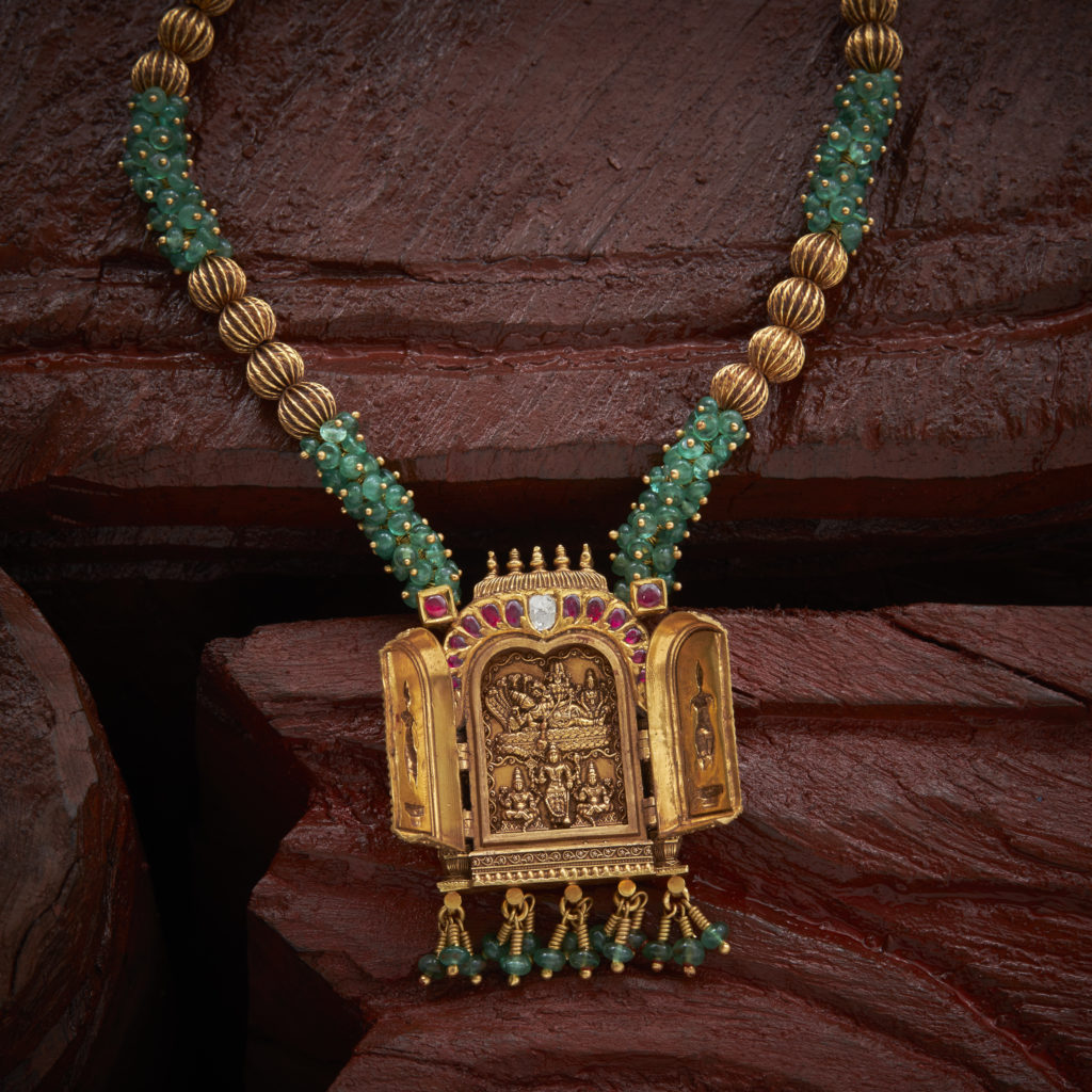 Antique Gold And Emerald Temple Pendant with open and shut gold locket