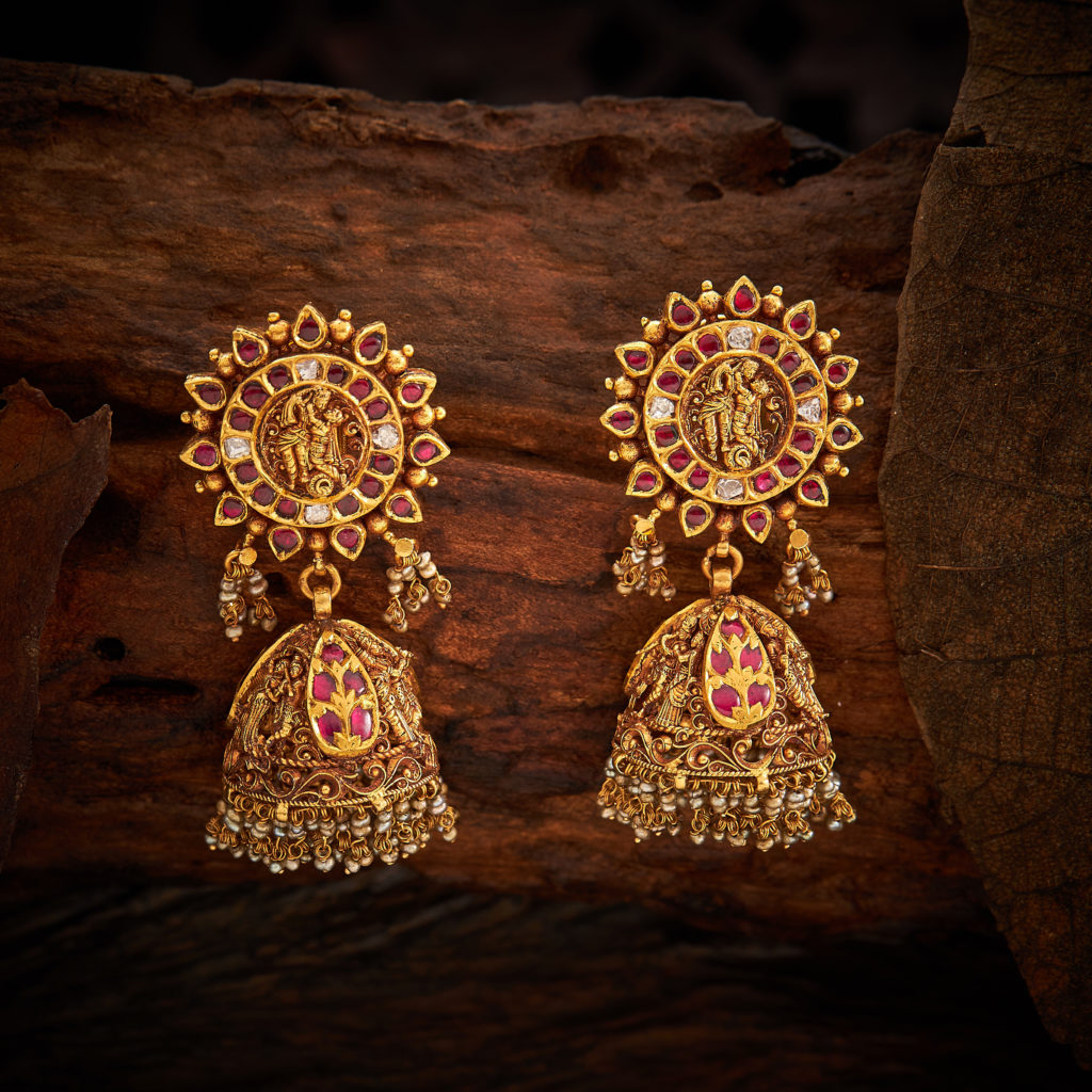 Temple gold Jhumkas to make it look more traditional